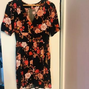 Dress. Mid thigh length. Cinched at the waist.